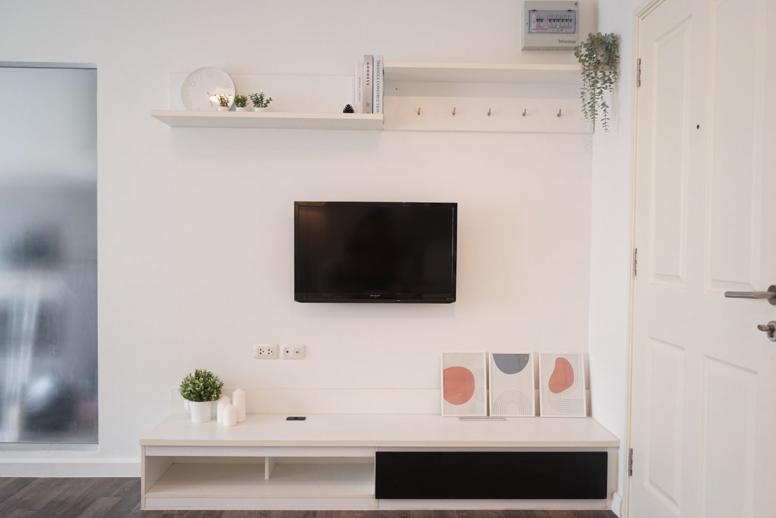 TV wall and shelving restyled by RAPH Studio